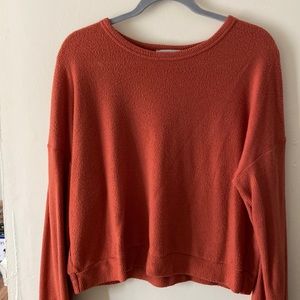 Orange sweater, supper soft, perfect to wear with ripped jeans